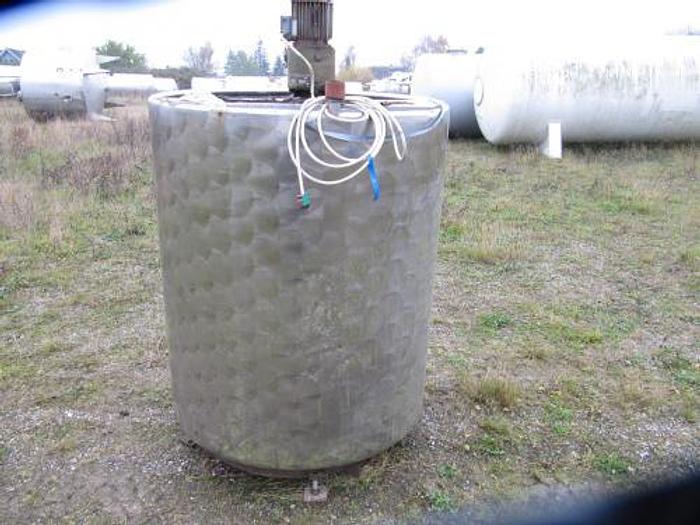 Used 1500 liter stainless steel tank with open top.