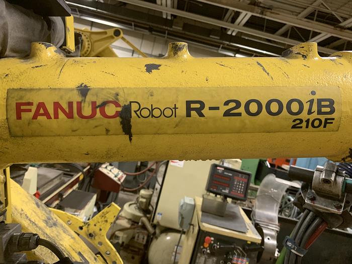 Used FANUC R2000iB/210F 210KG X 2655MM REACH 6 AXIS CNC ROBOT W/R30iA CONTROLS WITH ARO SERVO GUN