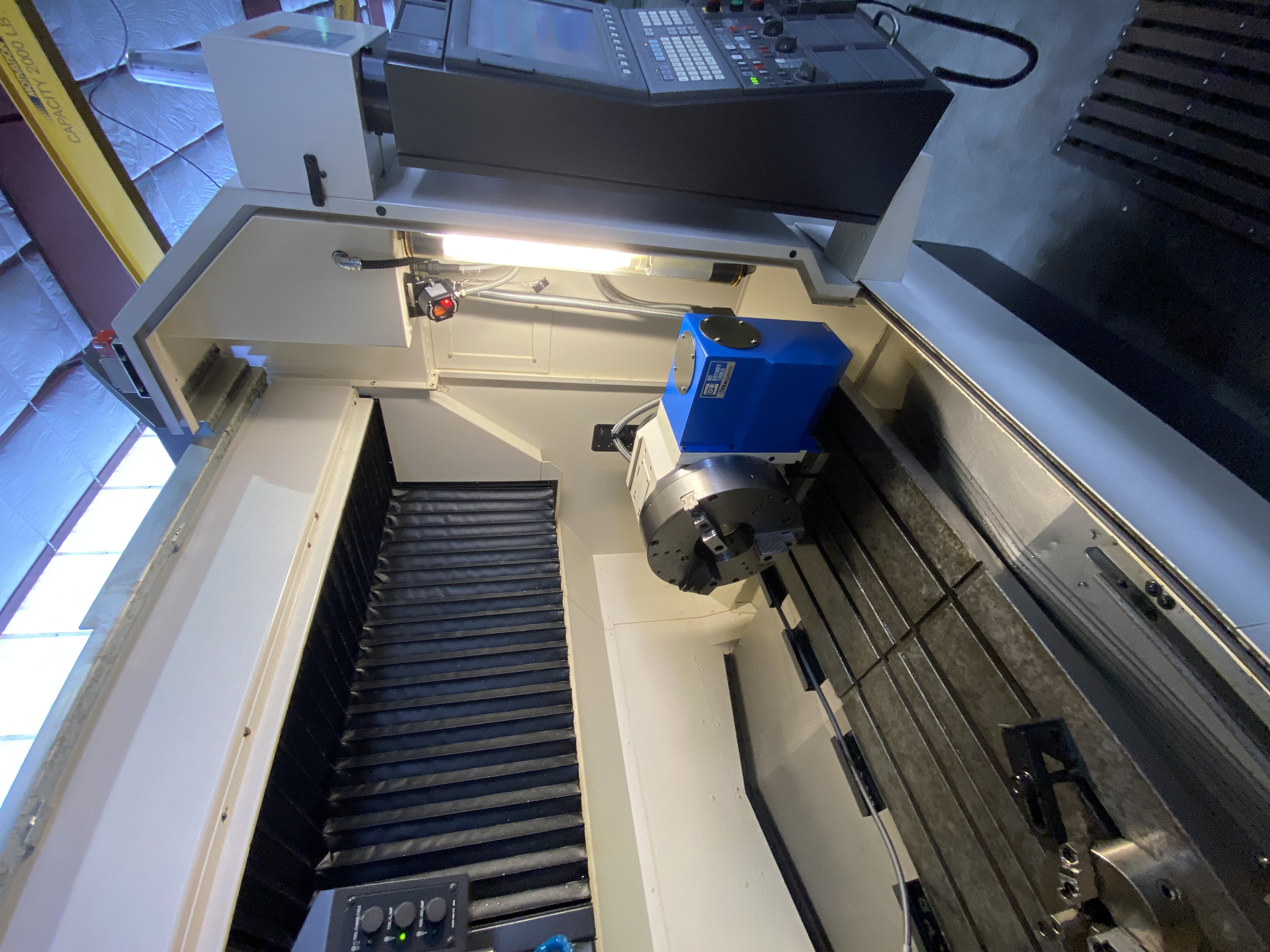 Used 2014 Okuma M560-V Mill W/2022 KITAGAWA MK350MKD01 4TH AXIS SN:S23542 THRU HOLE 6.300” Set up with 200 psi Thru Hole Collant Unit