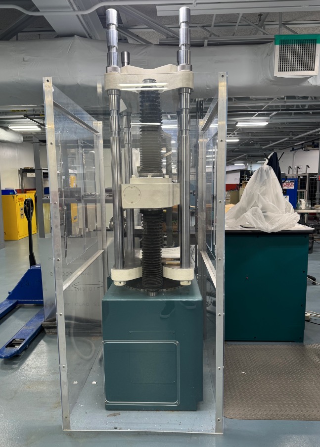 Used 2015 Tinius Olsen Super "L" Hydraulic Universal Testing Machine with Pressure Transducer Weighing, Servovalve Loading System, Model 602 Remote Display & Controller w/ Epsilon 3542 Extensometers