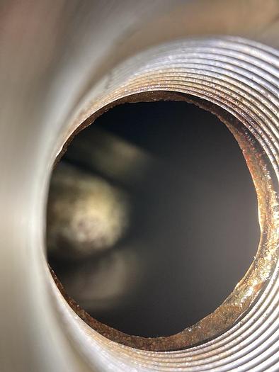 Used Used approximately 250 gallon stainless steel vertical tank