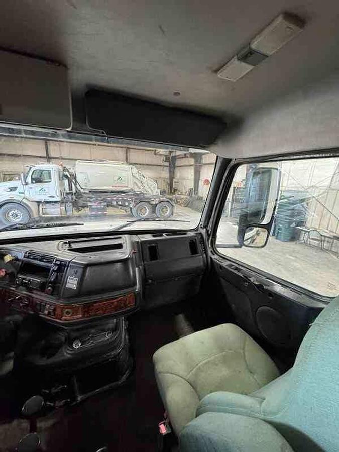 Used 2002 Volvo VHD Roll-Off Truck