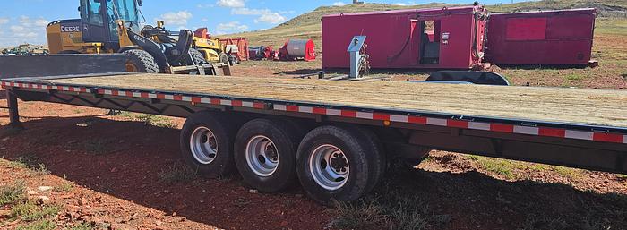 Used Holland Flatbed 8ft x 32ft Tri-Axle Flatbed