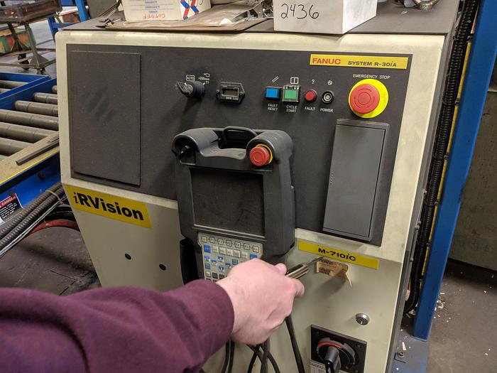 Used 2012 FANUC M710iC/50 6 AXIS ROBOT WITH IR VISION AND R30iA CONTROLLER.