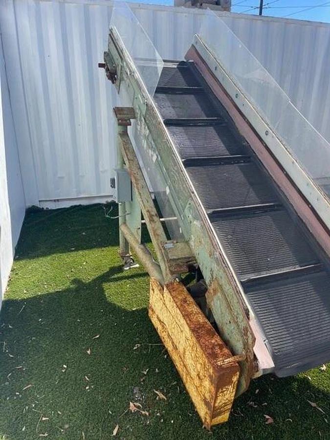 Used Conveyor Belt W: 28", L: 9'8" Cleated Incline w/ Leeson 2 HP at 1740 RPM