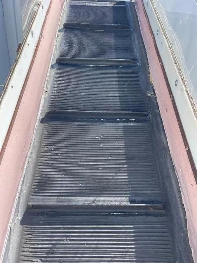 Used Conveyor Belt W: 28", L: 9'8" Cleated Incline w/ Leeson 2 HP at 1740 RPM