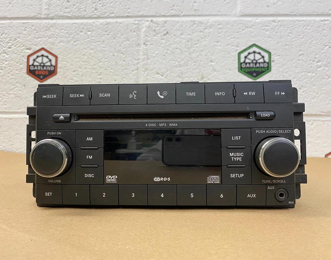 Used Chrysler Corp. 05064921 AE Jeep Radio AM/FM 6 Disc-MP3, WMA *WORKING*