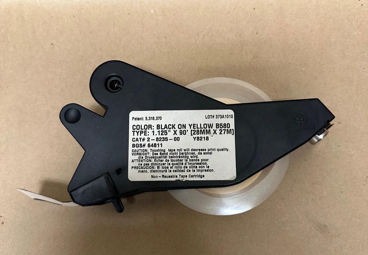 Used Brady B580 Black on Yellow, 1.125” x 90’ Label Cartridge, Roughly 30’ Left