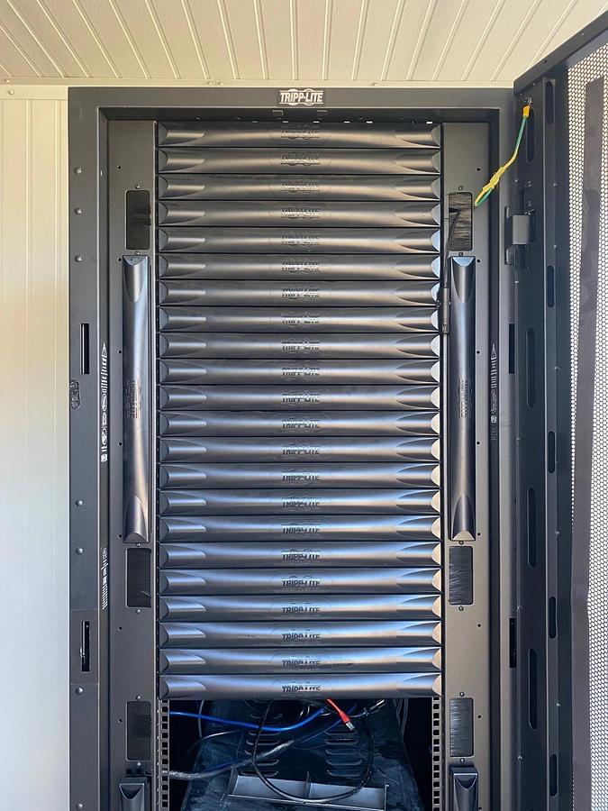 Used Tripp-Lite SmartRack Enclosure, APC SMX3000LVNC Smart-UPS X Battery