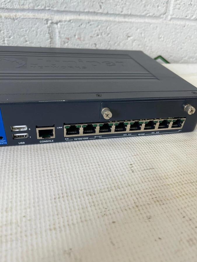 Used Juniper SRX210 8-Port 10/100 PoE Services Gateway - New