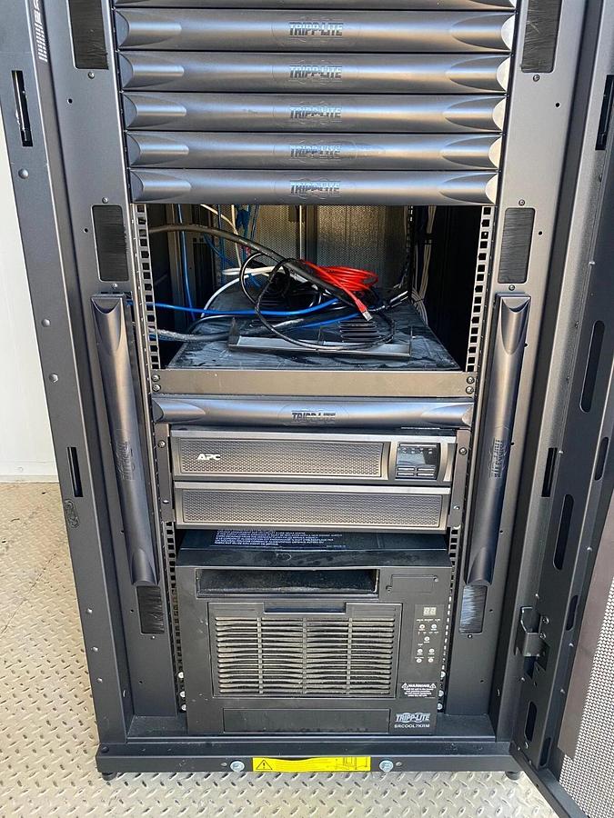 Used Tripp-Lite SmartRack Enclosure, APC SMX3000LVNC Smart-UPS X Battery