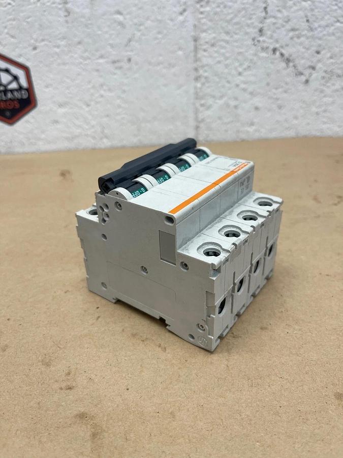 Used Merlin Gerin 24557 Circuit Breaker, 20 A, Multi 9 C60, 4 Pole, 480Y/277V