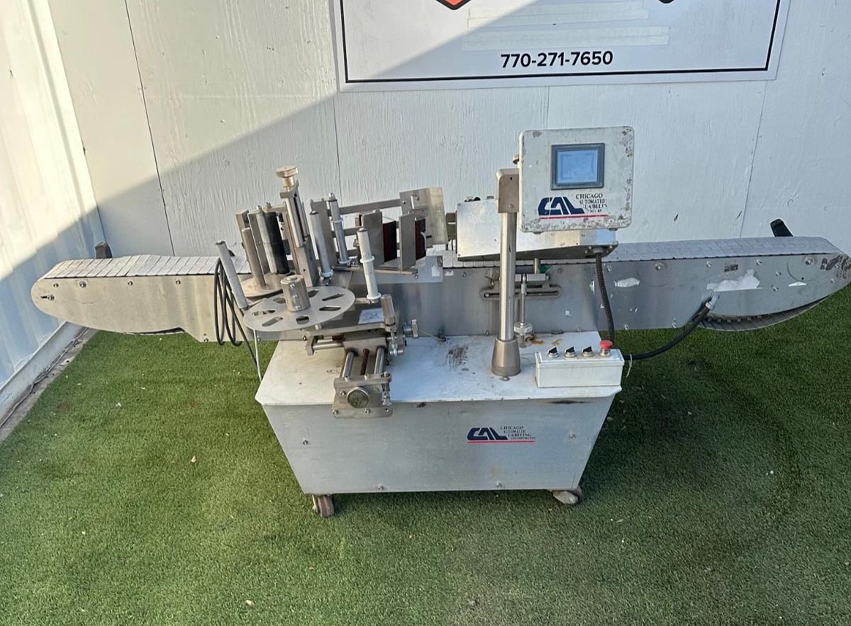 Used Chicago Automated Labeling Wrap Labeler, 120VAC, 20A, 7.5” W x 10’ L Belt