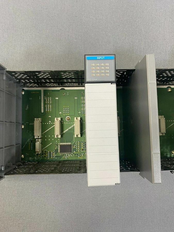 Used Allen Bradley (1) 1746-P2 Power Supply, (1) 1746-A10 10 Slot Rack, (2) 1746-IB16