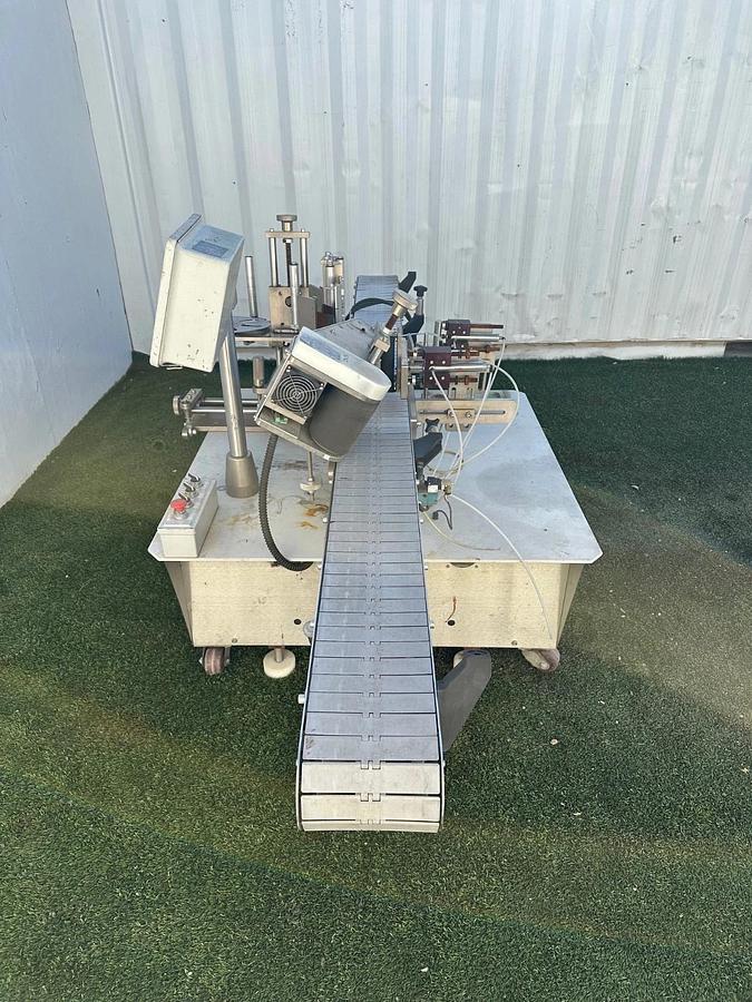 Used Chicago Automated Labeling Wrap Labeler, 120VAC, 20A, 7.5” W x 10’ L Belt