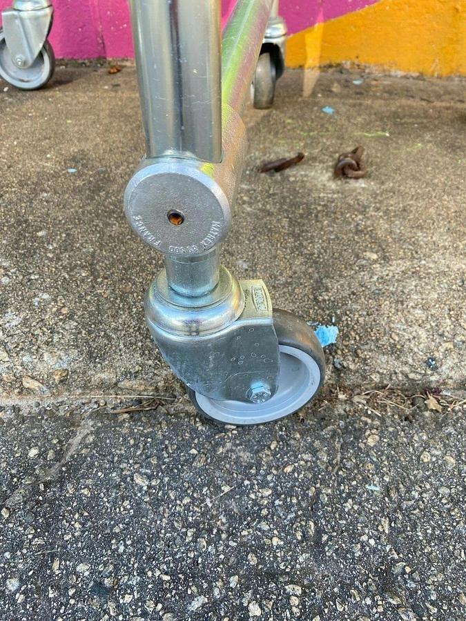 Used Matrex 89500 Portable Expandable Roller Conveyor, 6’ to 15’, On Casters