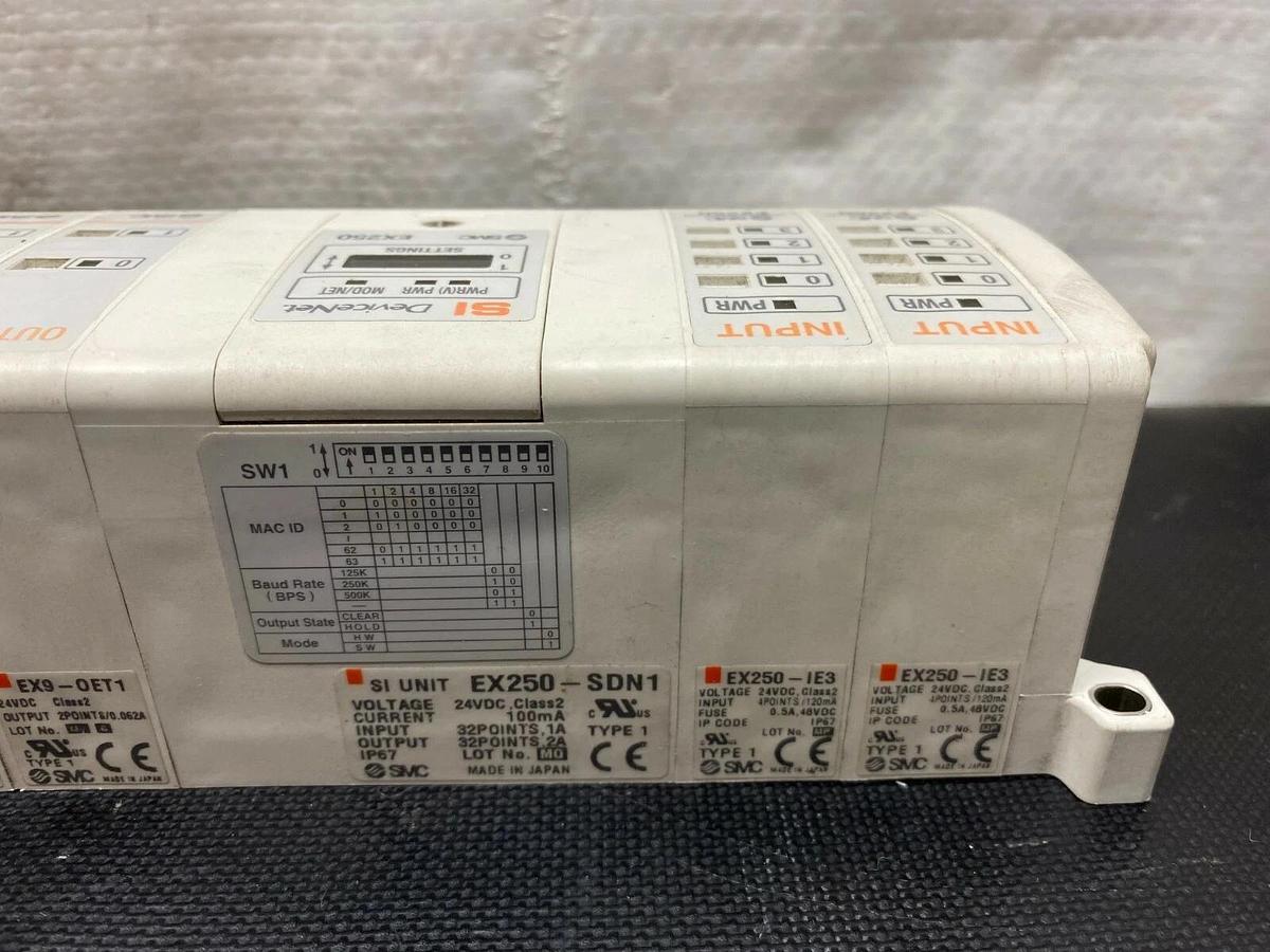 Used SMC EX250-SDN1 w EX250-IE3 (2 Count), EX9-OET1 (4 Count) and VQ2401N-5B