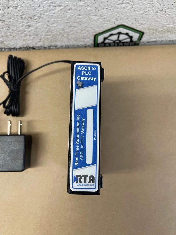 Used RTA (Real Time Automation Inc) 435NBX, ASCII to PLC Gateway, with Power Supply