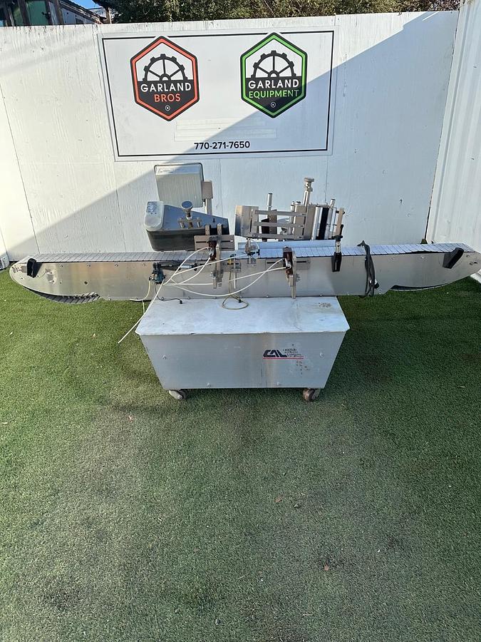 Used Chicago Automated Labeling Wrap Labeler, 120VAC, 20A, 7.5” W x 10’ L Belt