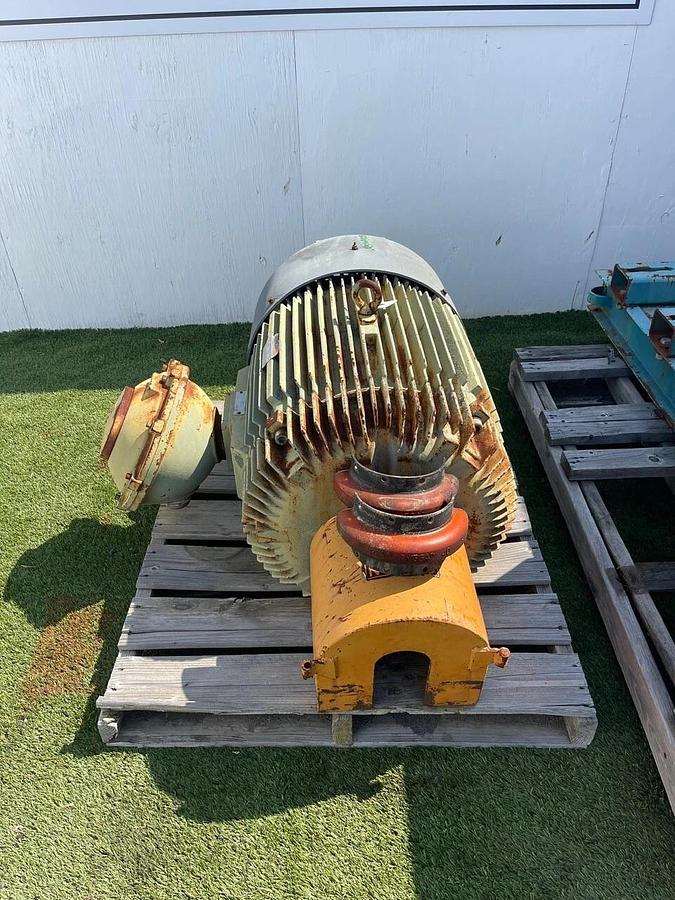 Used Champion 30X22 Hammer Mill w/ Reliance 125HP, 3750RPM Motor, S/N 102149