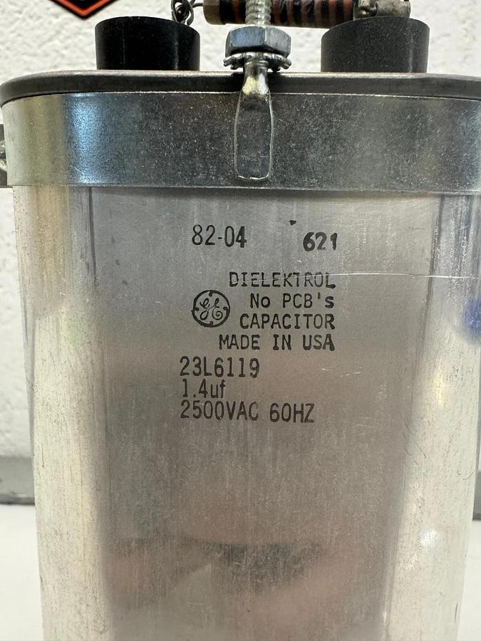 Used GE Dielektrol 23L6119 Oval Capacitor,  2500 VAC, 60Hz, 1.4uf