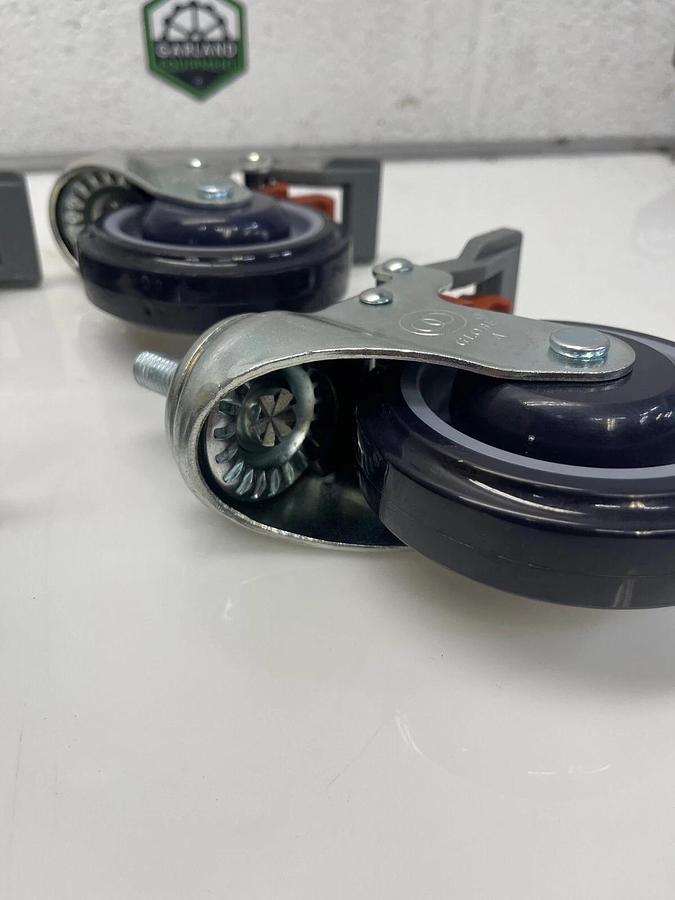 Used Globe 4" Caster Swivel Lock Med Duty 1” Tall Stem 1/2” Thread Polyurethane Wheel