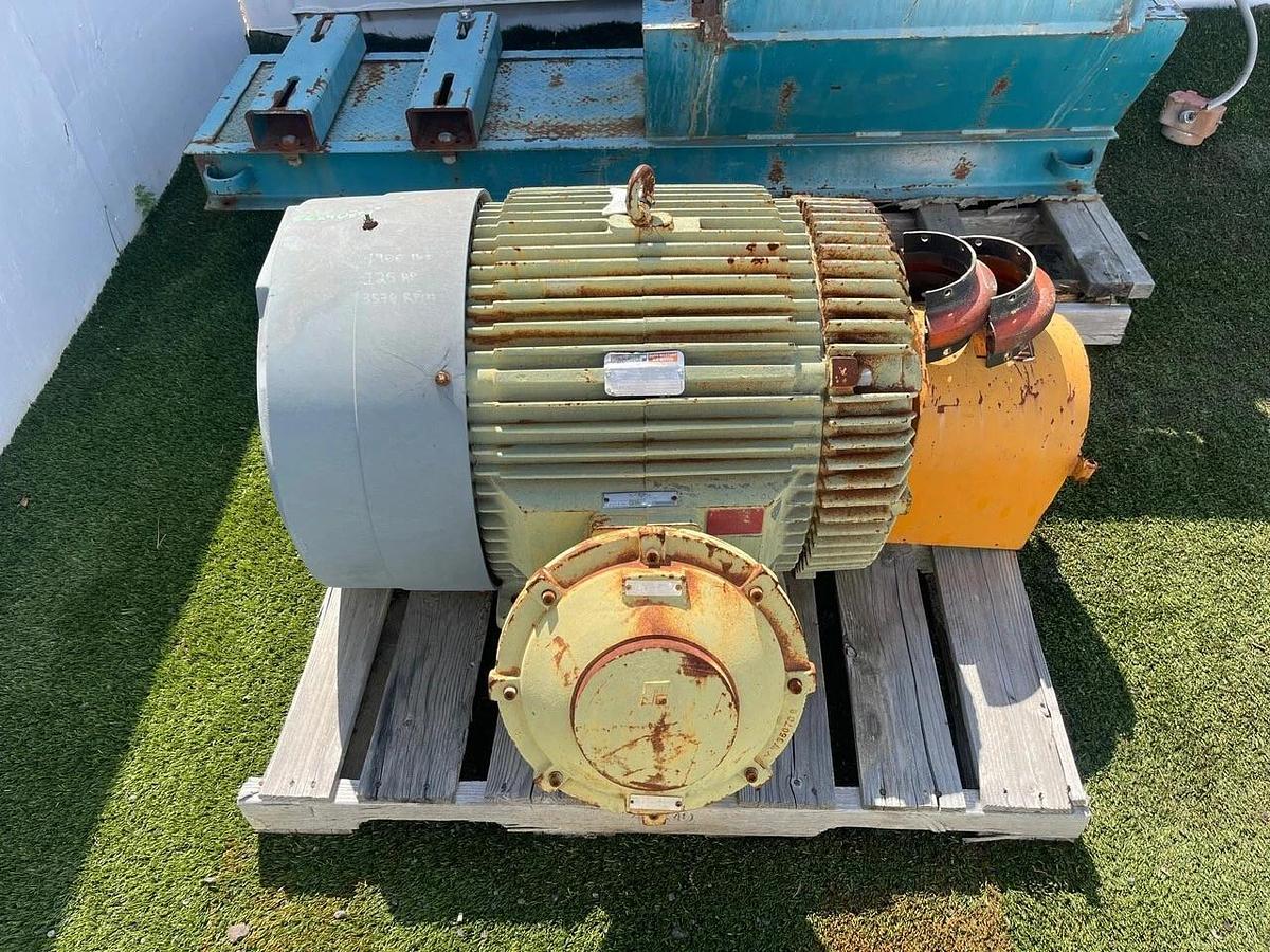 Used Champion 30X22 Hammer Mill w/ Reliance 125HP, 3750RPM Motor, S/N 102149