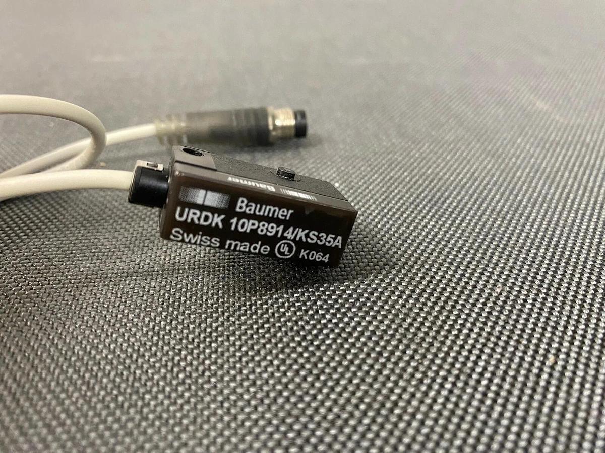 Used Baumer URDK 10P8914/KS35A Miniature Ultrasonic Retro-Reflective Sensor