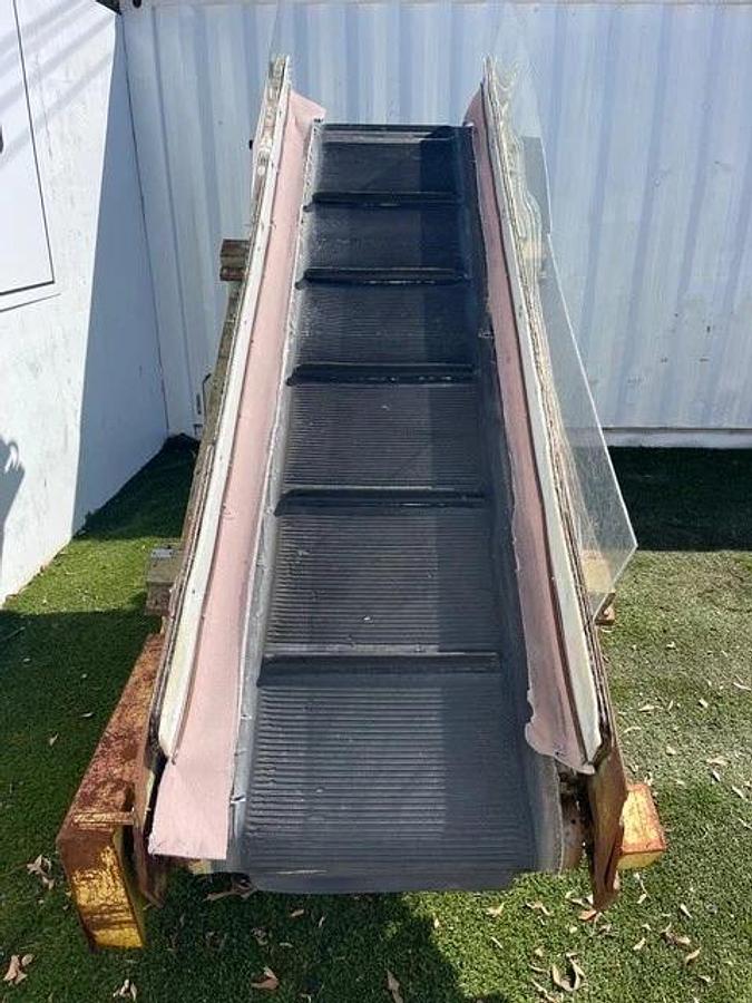 Used Conveyor Belt W: 28", L: 9'8" Cleated Incline w/ Leeson 2 HP at 1740 RPM