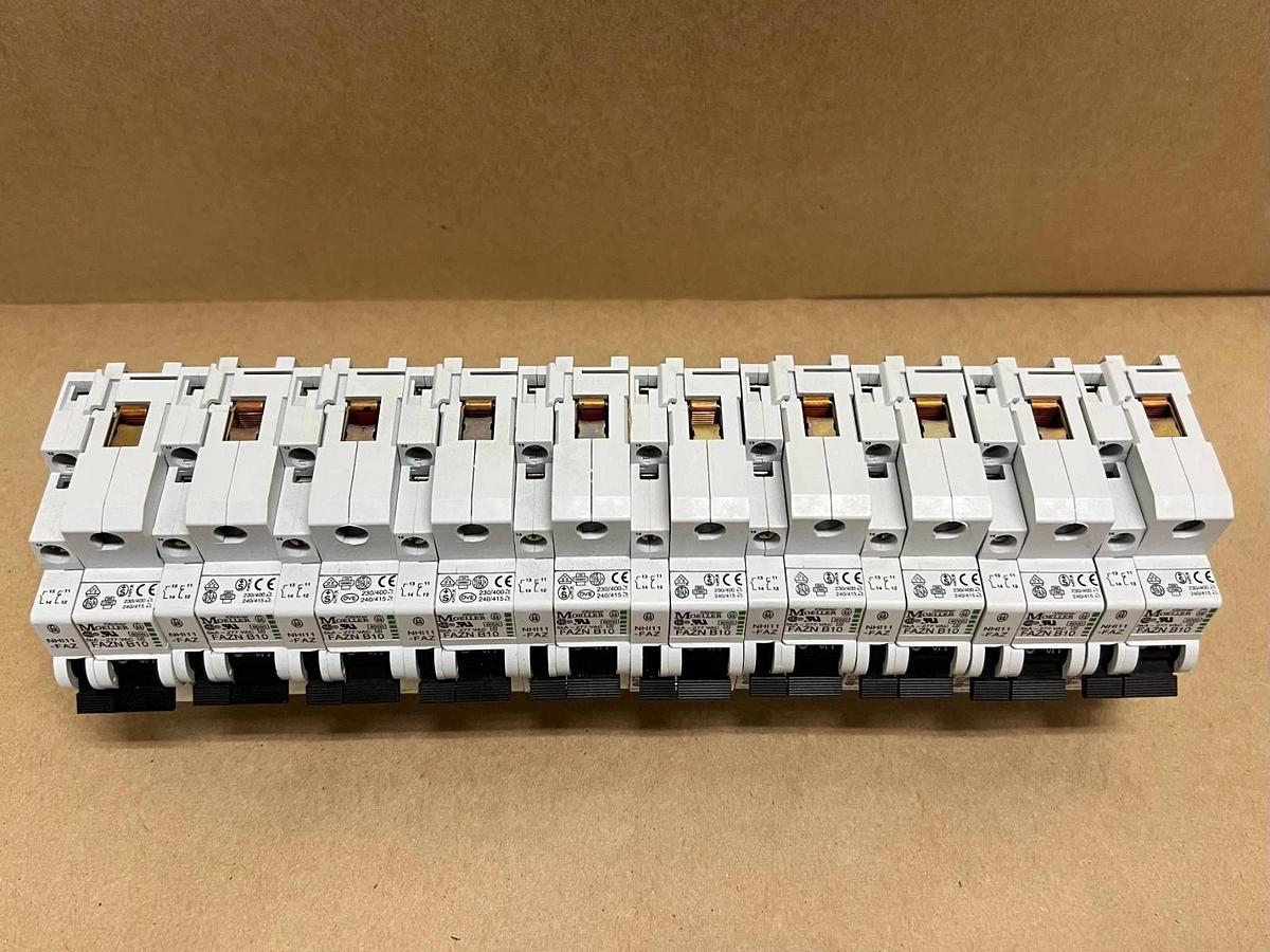 Used Moeller FAZN B10 10A, 1P Circuit Breaker w/NHI11-FAZ Aux. Contact - Lot of 10