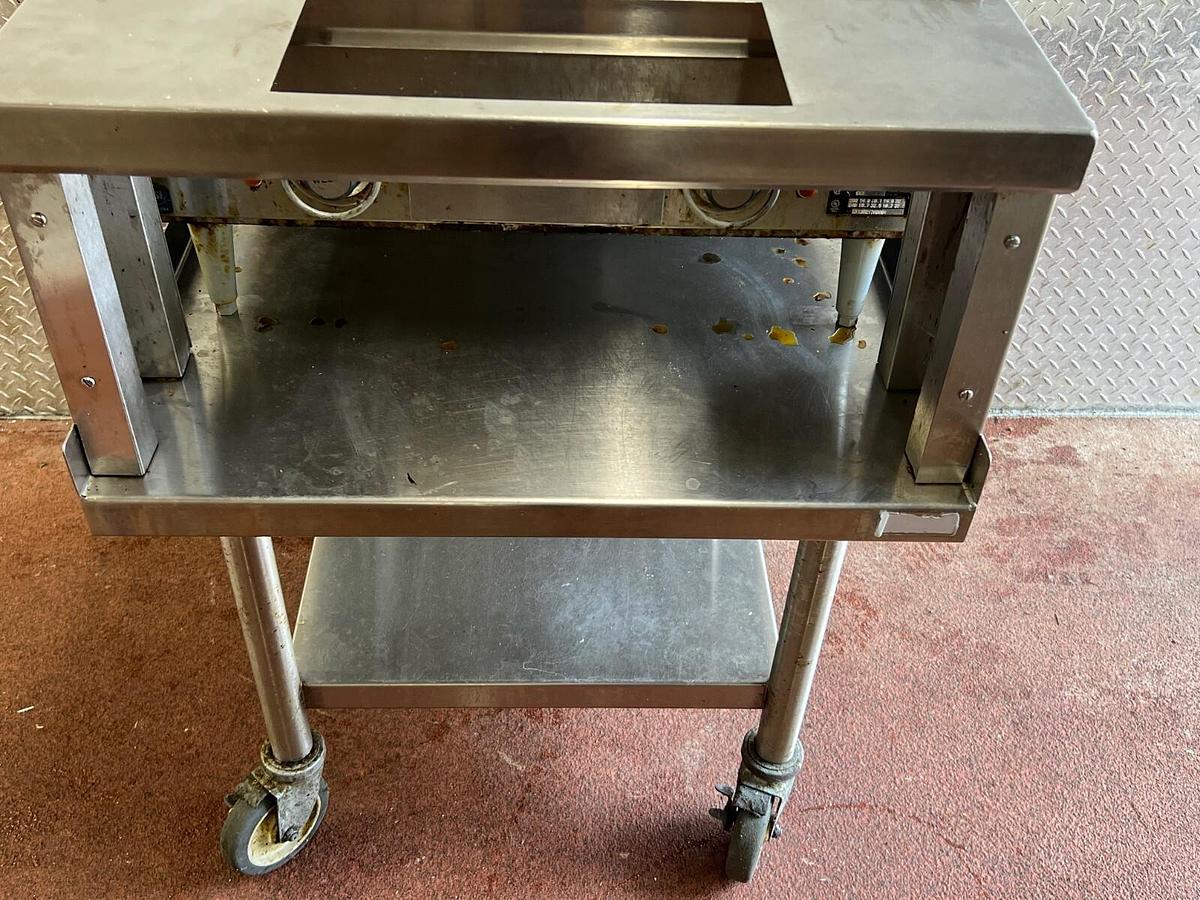 Used Select Stainless 30” x 24” x 36” Stainless Table with Casters
