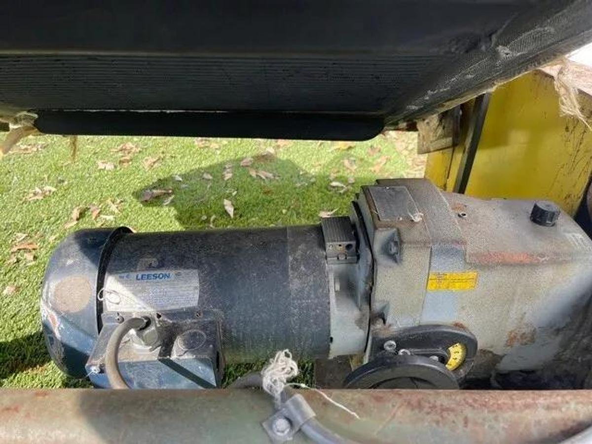 Used Conveyor Belt W: 28", L: 9'8" Cleated Incline w/ Leeson 2 HP at 1740 RPM