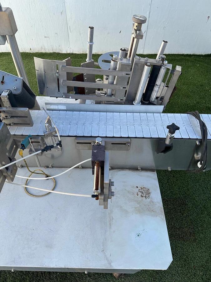 Used Chicago Automated Labeling Wrap Labeler, 120VAC, 20A, 7.5” W x 10’ L Belt