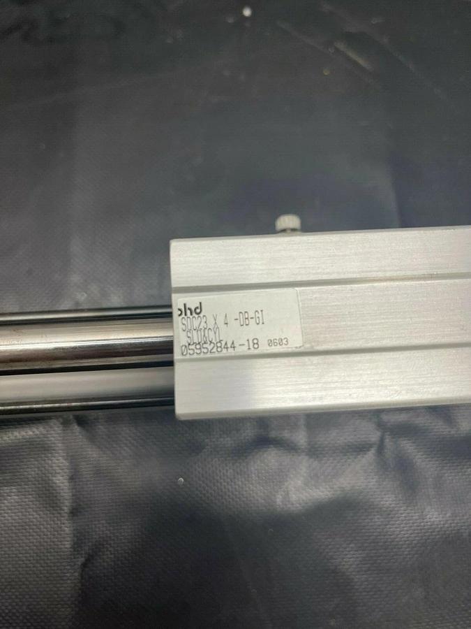 Used PHD SDC23 X 4-DB-GI Pneumatic Slide and Cylinder
