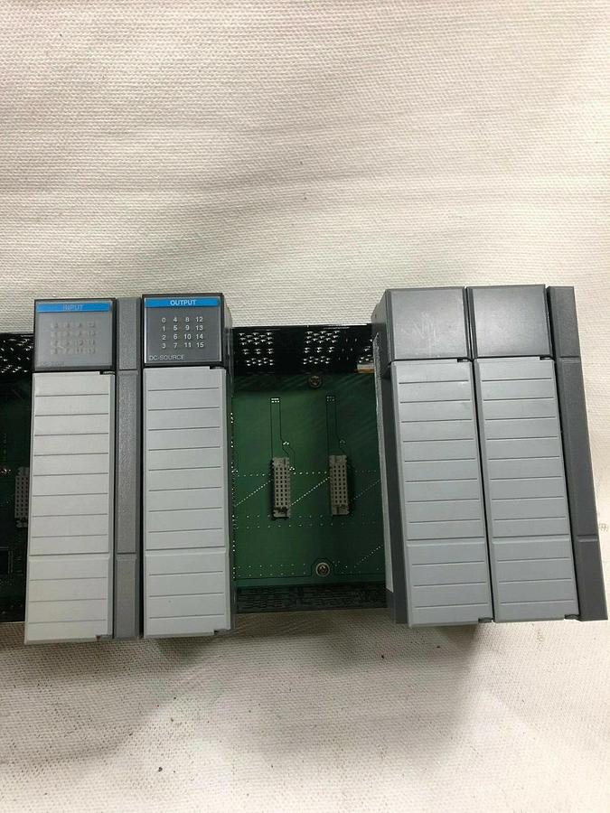 Used Allen Bradley 1746-A10 10 Slot Rack w/ 1746-P2 Power Supply and 3 Other Modules