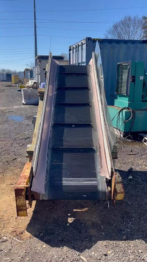 Used Conveyor Belt W: 28", L: 9'8" Cleated Incline w/ Leeson 2 HP at 1740 RPM