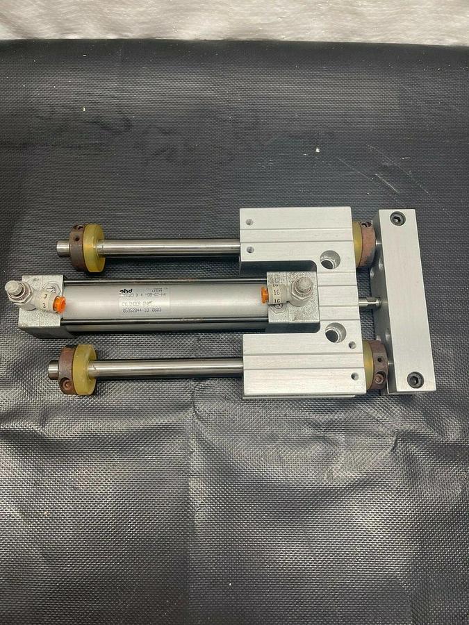 Used PHD SDC23 X 4-DB-GI Pneumatic Slide and Cylinder