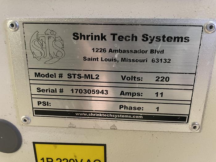 Used Felins Shrinktech L-Sealer with conveyors