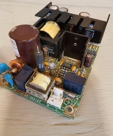 Used Power General FLU1-50-3, 12V DC / 4.2A from Beckman DU 530 Spectrophotometer