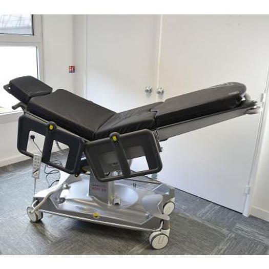 Used ANETIC AID QA4 UNIVERSAL ELECTRIC MOBILE SURGICAL TABLE
