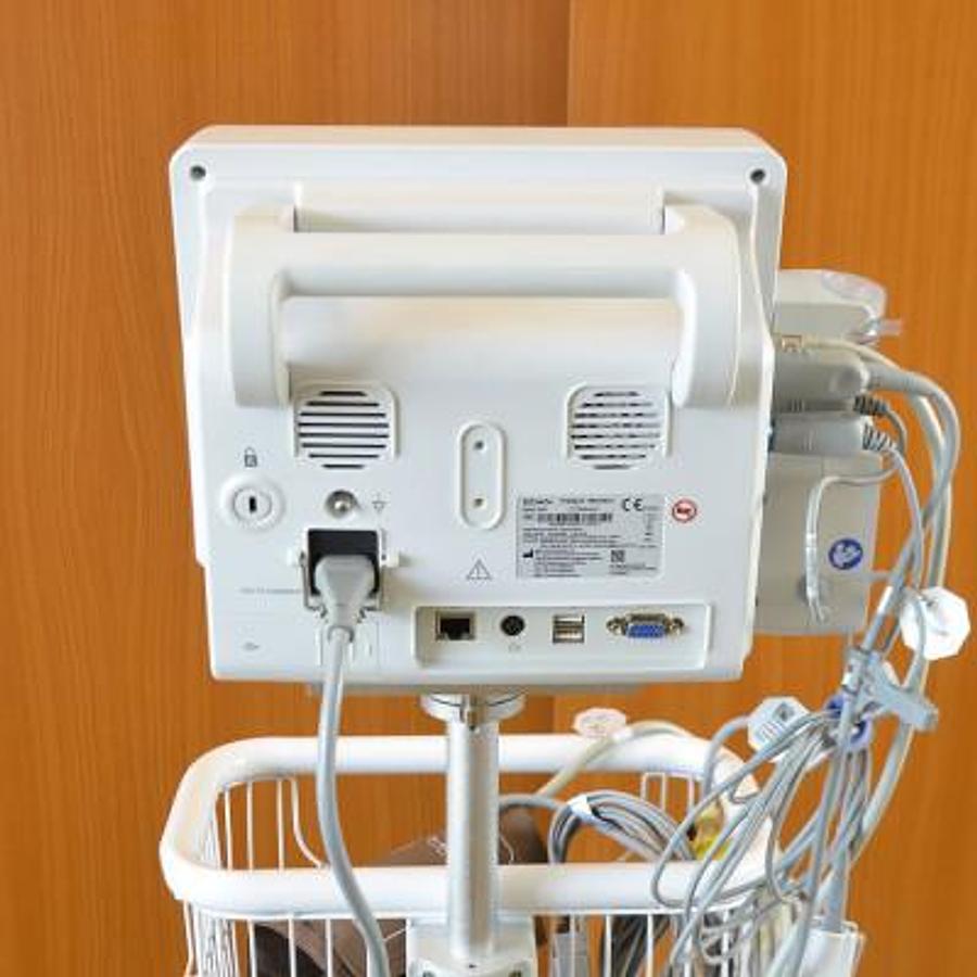 Used EDAN iM50 MULTIPARAMETER MONITORING SYSTEM (ECG, NIBP, SPO2, RESP, WITH CO2 CAPNOGRAPHY) ON ITS ROLLING TROLLEY.