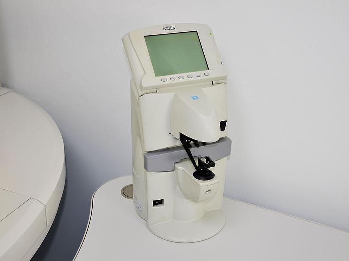 Used NIDEK OPHTHALMOLOGICAL CONSULTATION TABLE