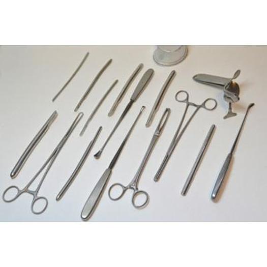 Used GYNECO TRAY WITH CANDLES AND CURETTES