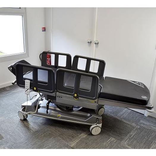 Used ANETIC AID QA4 UNIVERSAL ELECTRIC MOBILE SURGICAL TABLE