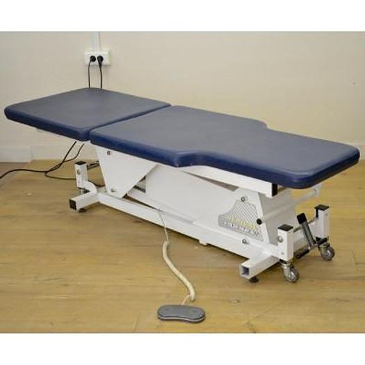 Used ELECTRICALLY HEIGHT-ADJUSTABLE EXAMINATION TABLE