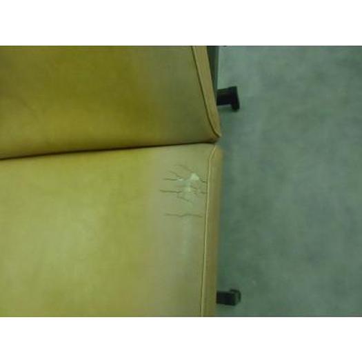 Used GYNECOLOGICAL EXAMINATION COUCH WITH STIRRUPS AND ADJUSTABLE LEG PLATE