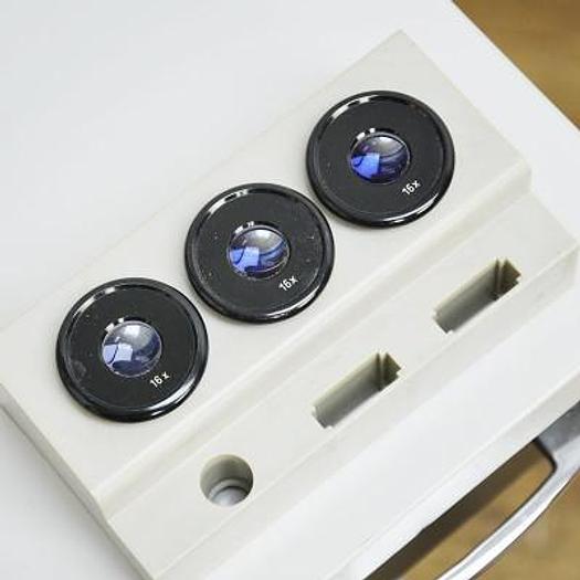 Used HAAG STREIT BM 900 SLIT LAMP ON HEIGHT-ADJUSTABLE TABLE