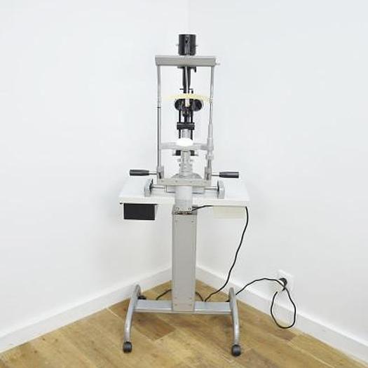 Used HAAG STREIT BM 900 SLIT LAMP ON HEIGHT-ADJUSTABLE TABLE
