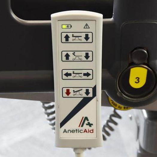 Used ANETIC AID QA4 UNIVERSAL ELECTRIC MOBILE SURGICAL TABLE