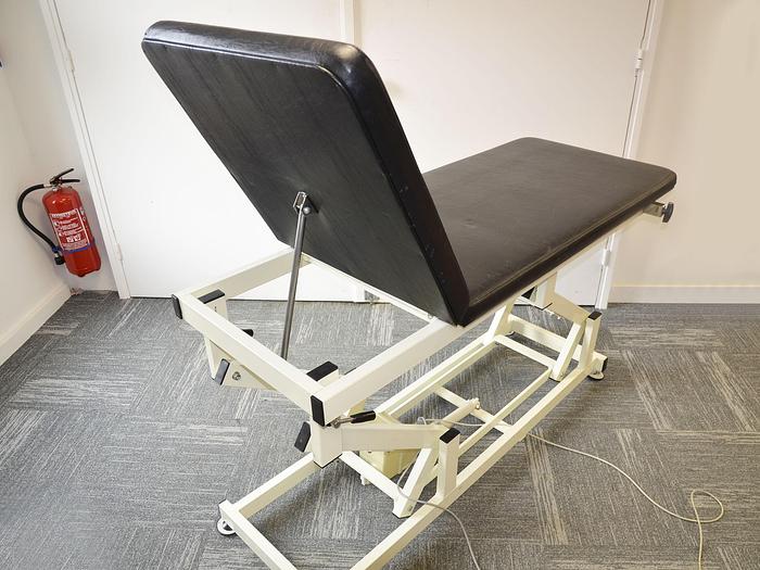 Used HENNING ELECTRIC EXAMINATION COUCH WITH TILTING HEADREST